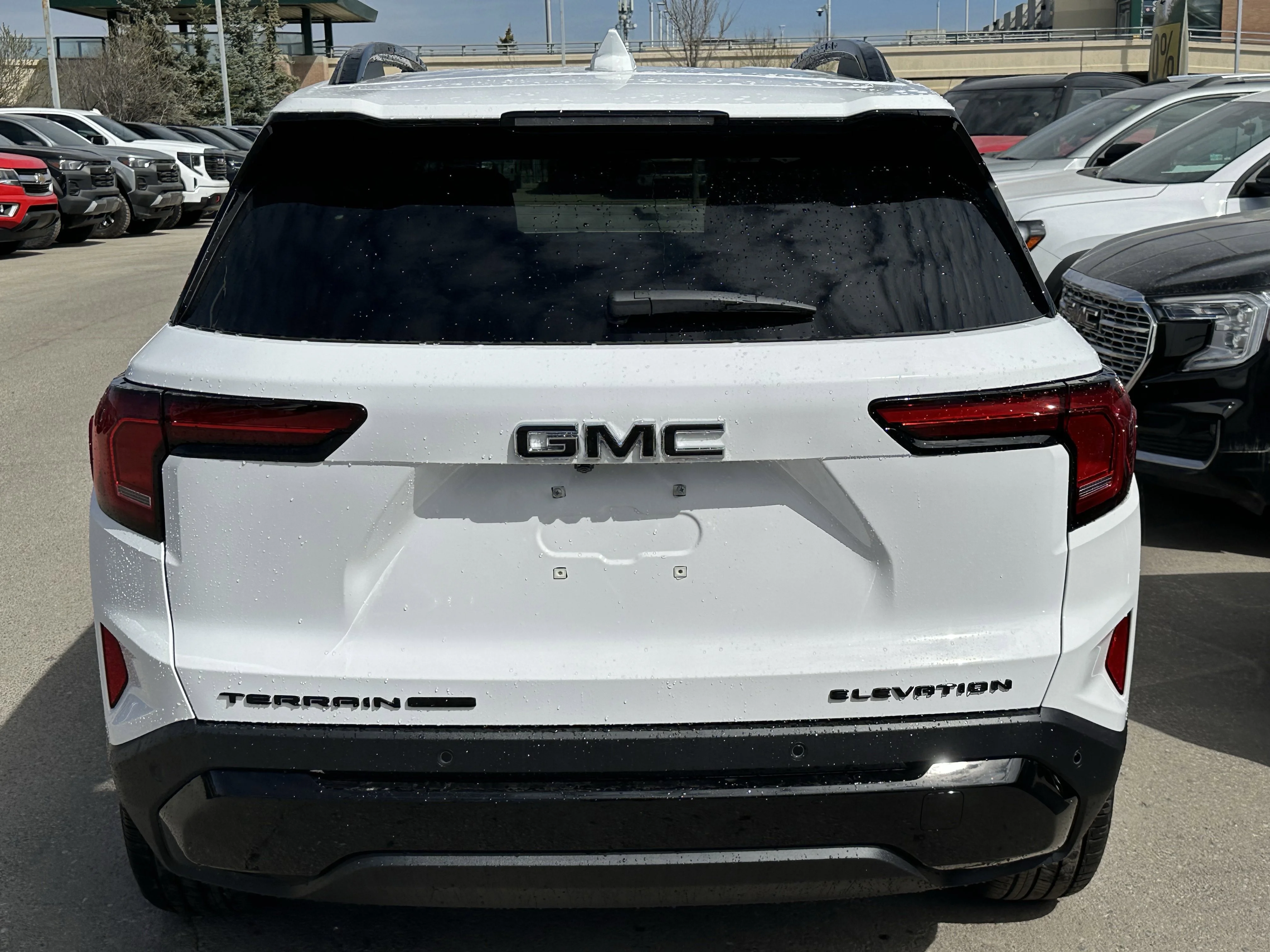 New 2026 Summit White GMC AWD Elevation image 5