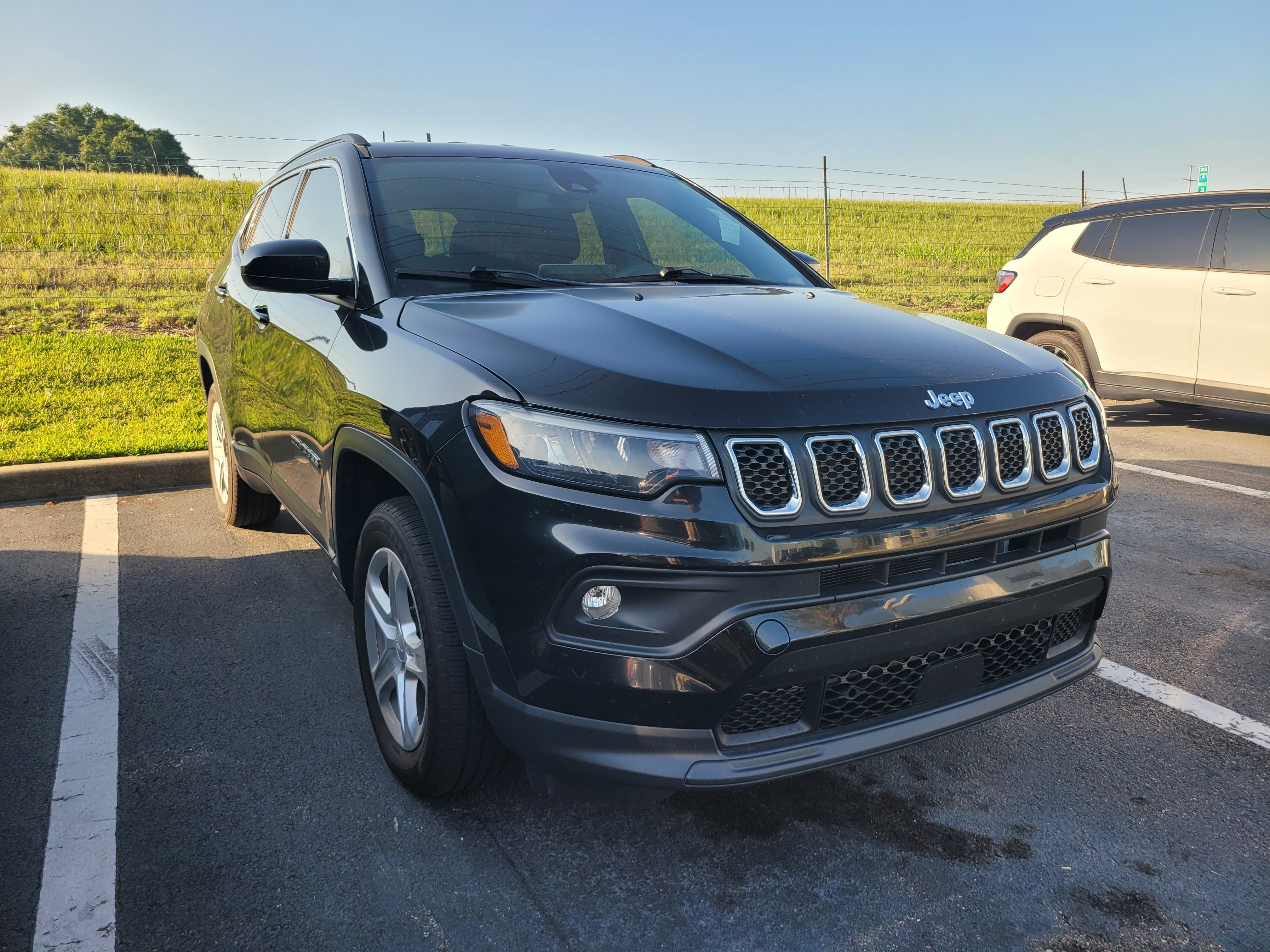 Used 2023 Diamond Black Crystal Pearlcoat Jeep Latitude image 1
