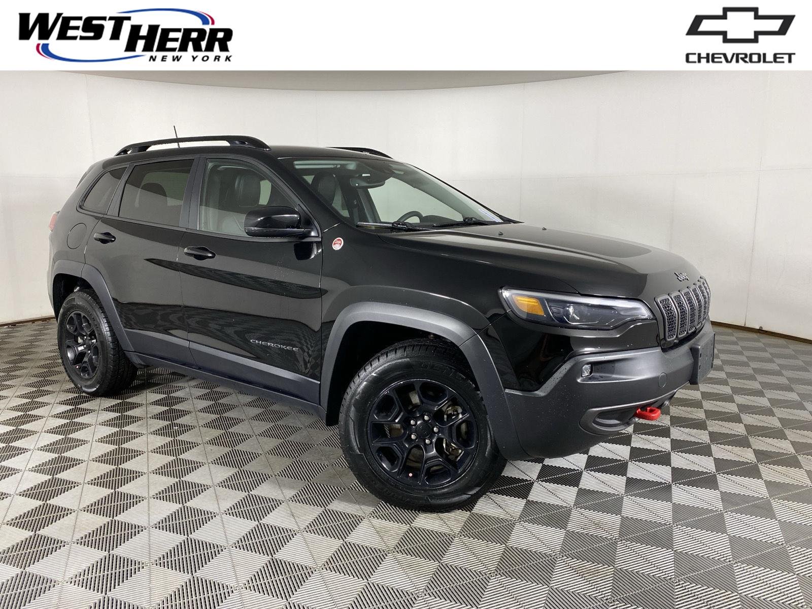 Used 2022 Diamond Black Crystal Pearlcoat Jeep Trailhawk image 1