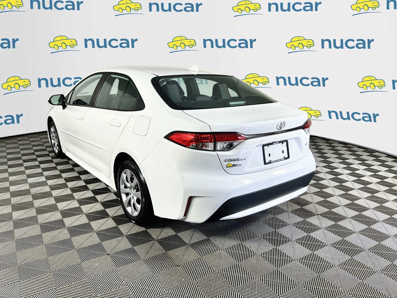 Used 2021 Super White Toyota LE image 5