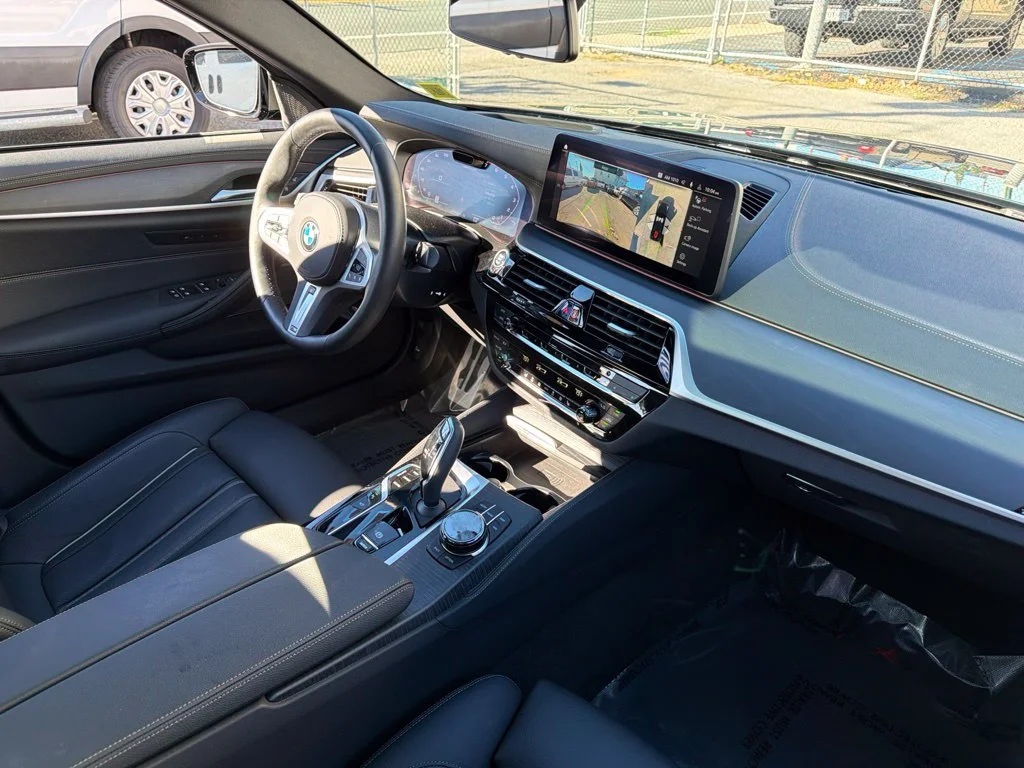 Used 2023 Black BMW M550i xDrive image 14