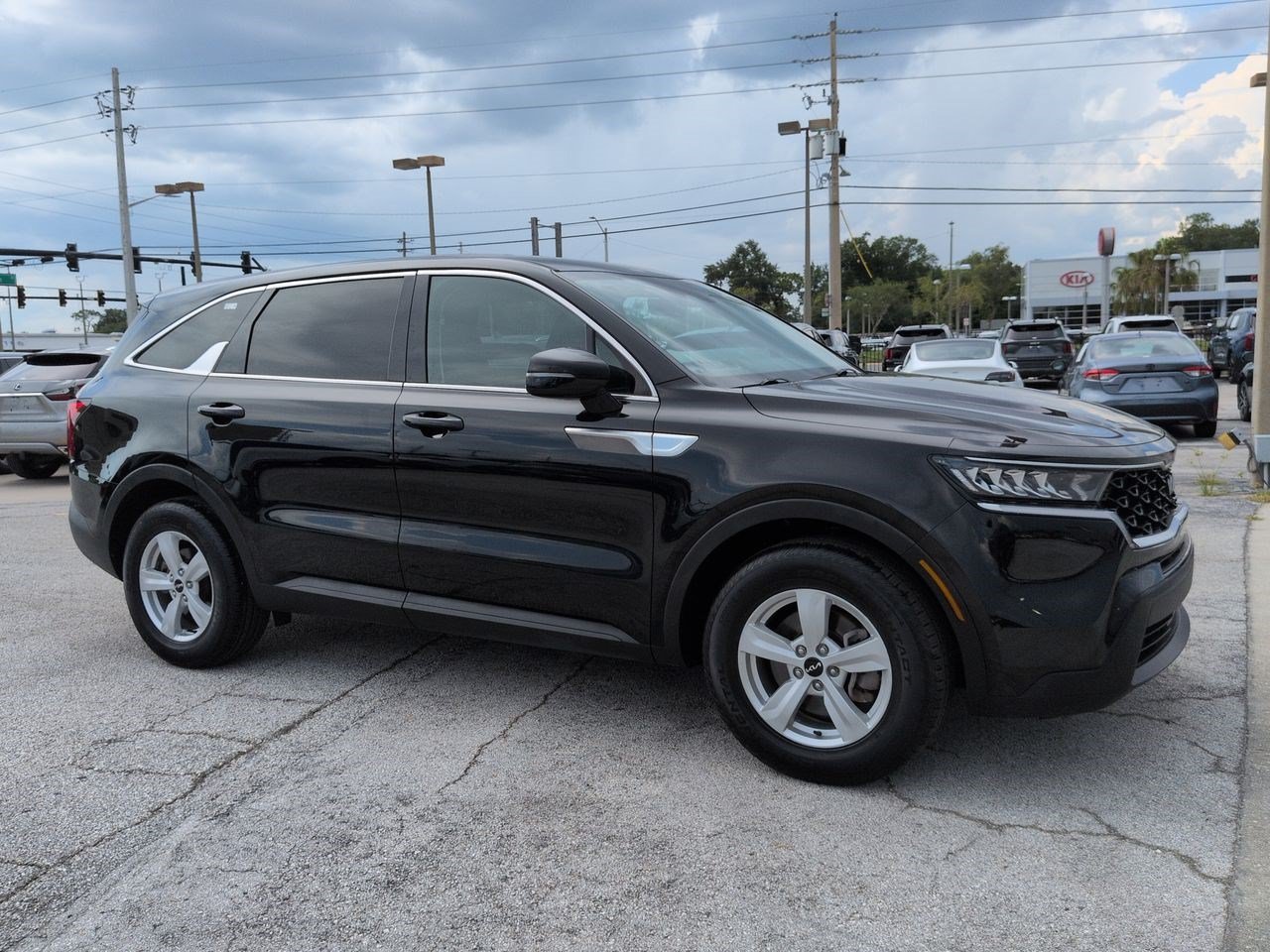 Certified Used 2023 Ebony Black Kia LX image 1