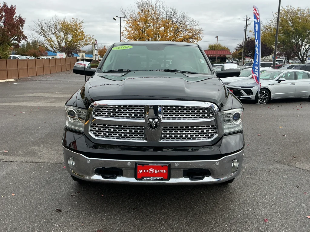 Used 2014 Black Clearcoat Ram Laramie image 1