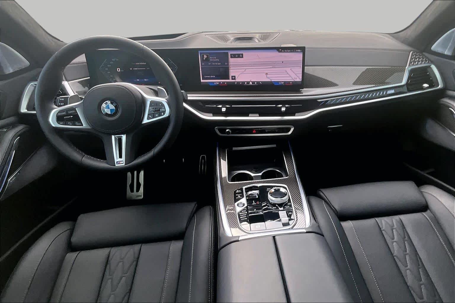 Used 2026 Black Sapphire Metallic BMW M60i image 14