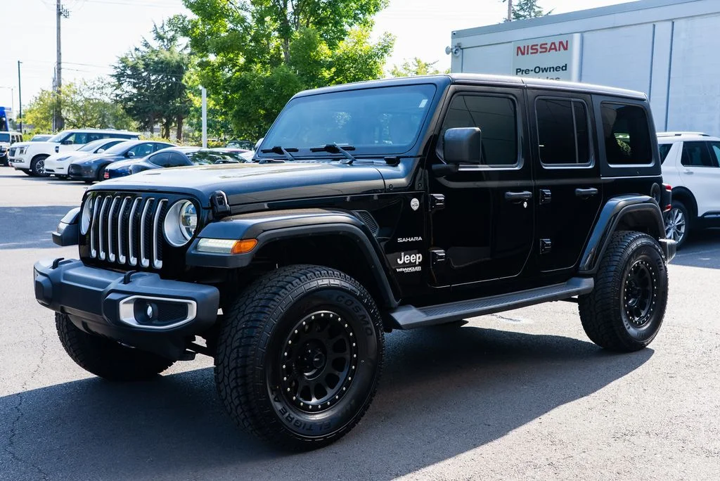 Used 2018 Black Jeep Unlimited Sahara image 3