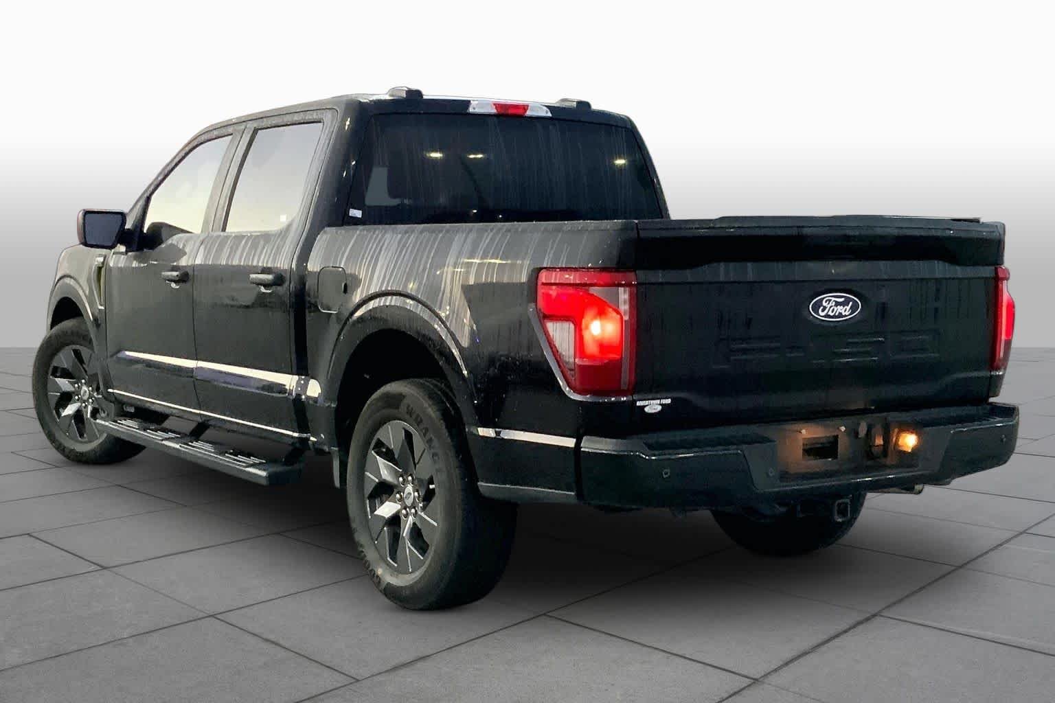 Used 2025 Agate Black Metallic Ford STX image 11