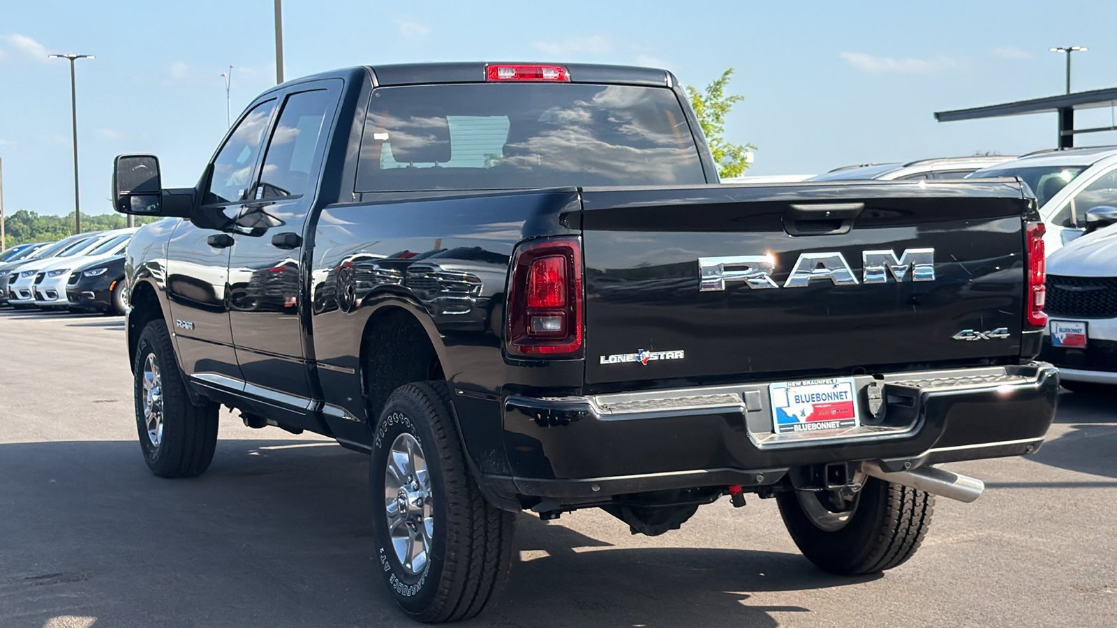 New 2026 Diamond Black Crystal Pearl-Coat Exterior Paint RAM Lone Star image 7