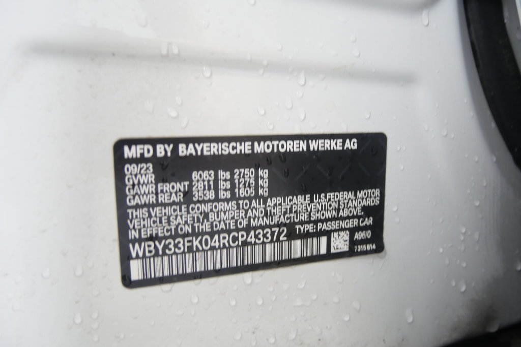 Certified Used 2024 White Metallic BMW eDrive40 image 28
