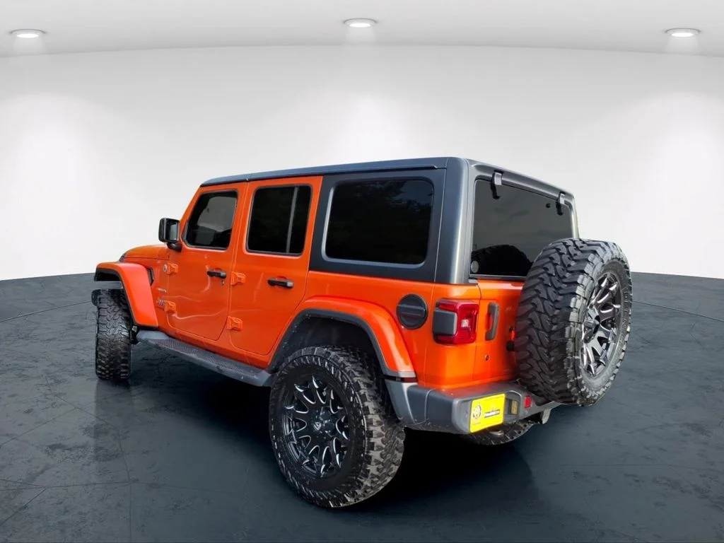 Used 2018 Orange Jeep Unlimited Sahara image 9