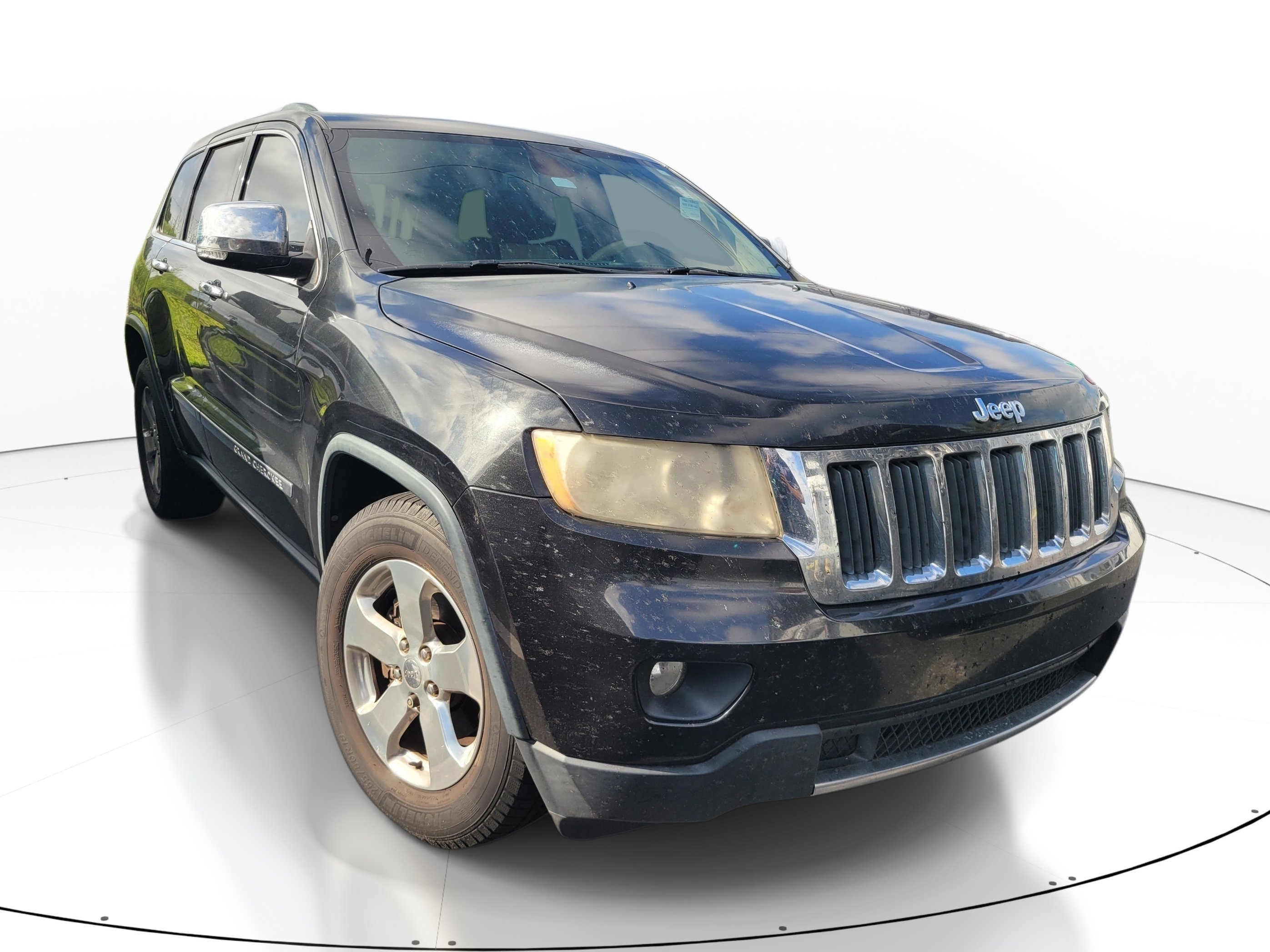Used 2013 Brilliant Black Crystal Pearl Jeep Limited image 1