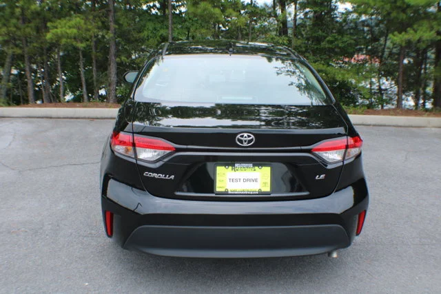 Used 2025 Midnight Black Metallic Toyota LE image 14