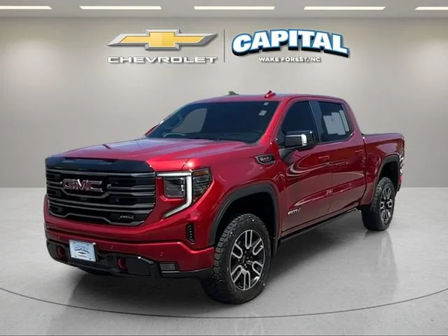 Used 2026 Volcanic Red Tintcoat GMC AT4 image 1