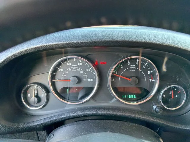 Used 2014 Red Jeep Unlimited Sahara image 17