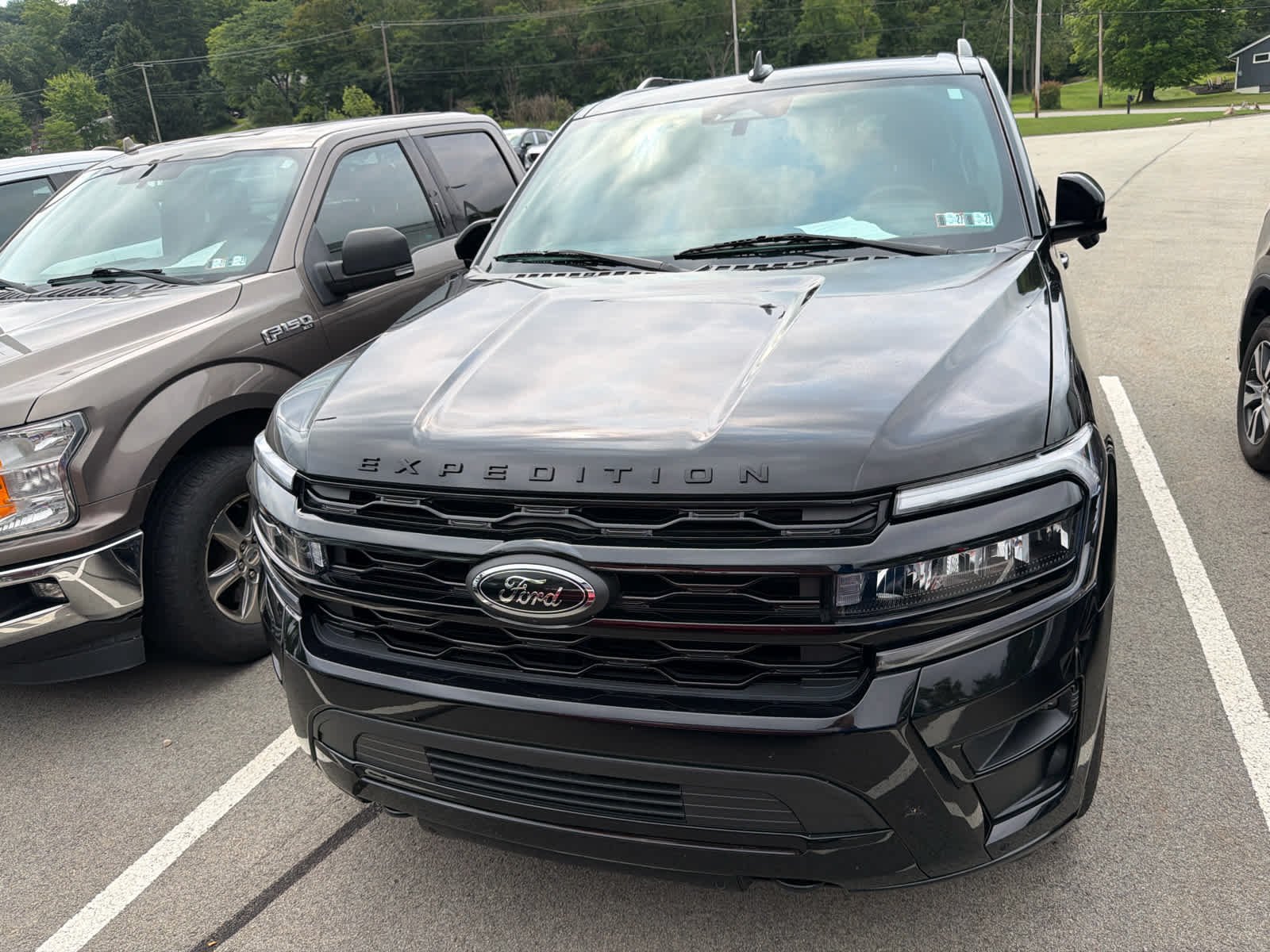 Used 2022 Agate Black Metallic Ford Limited image 2