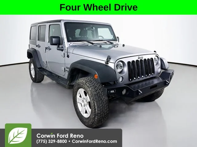 Used 2014 Billet Clearcoat Metallic Jeep Unlimited Sport image 1