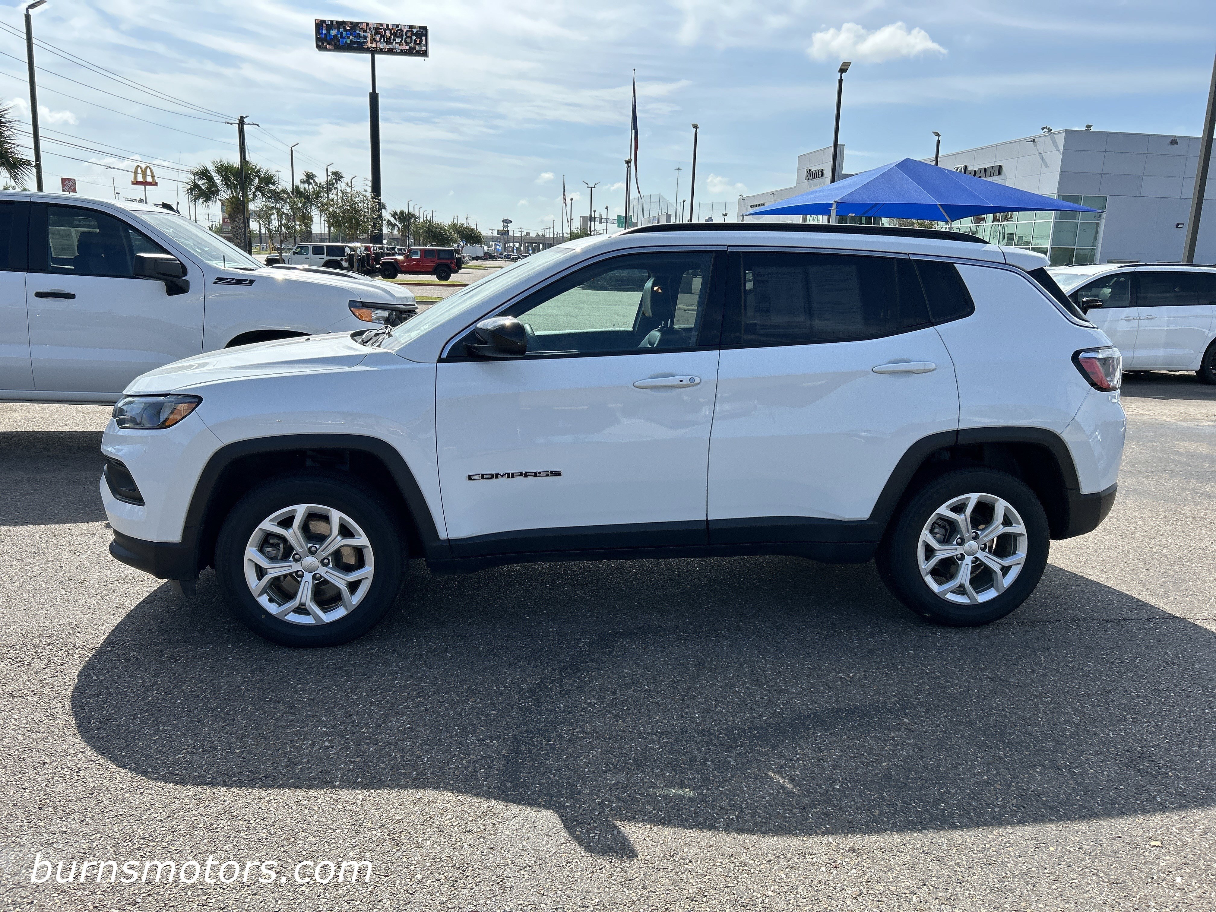 Used 2024 Bright White Jeep Latitude image 5