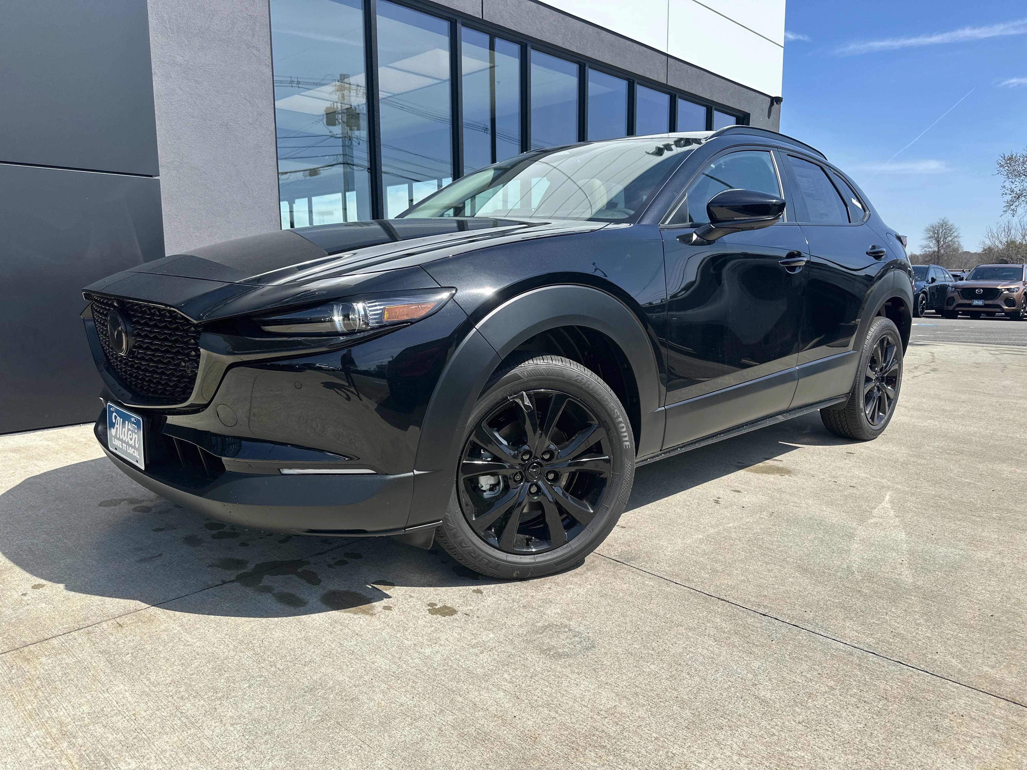 New 2026 Jet Black Mica Mazda 2.5 Turbo Aire Edition AWD image 1