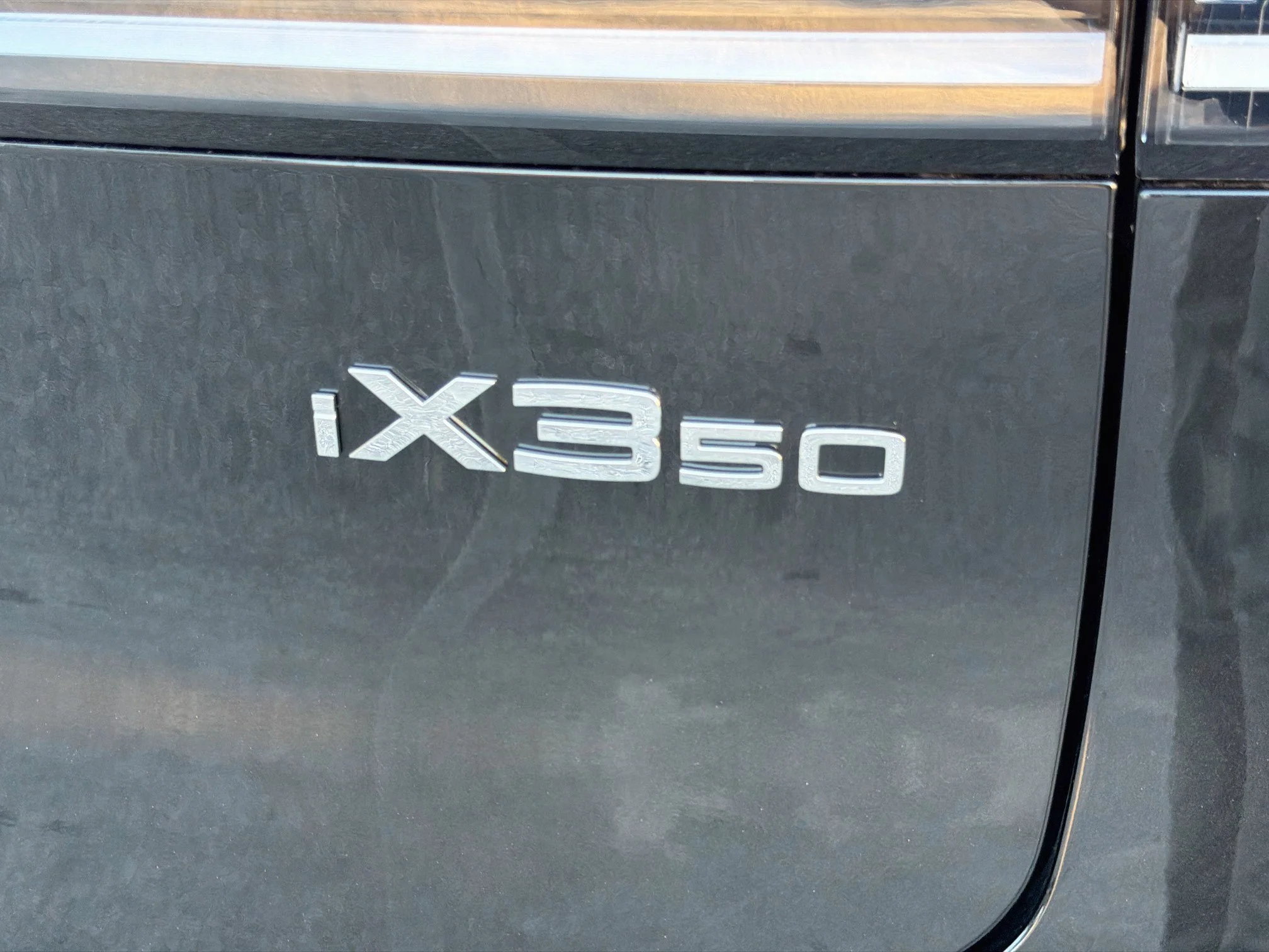 New 2027 Black Sapphire Metallic BMW 50 xDrive image 11