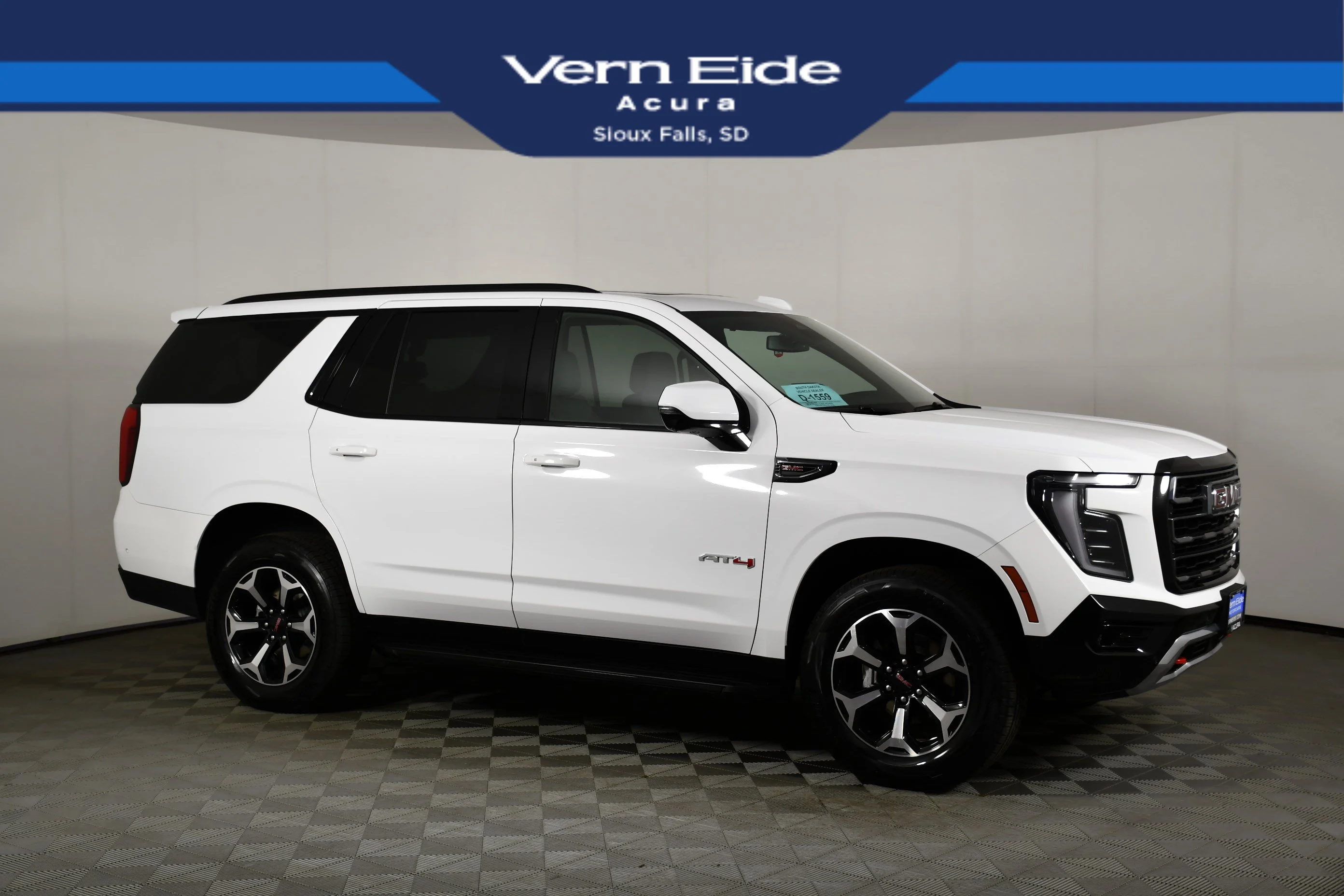 Used 2025 Summit White GMC AT4 image 1