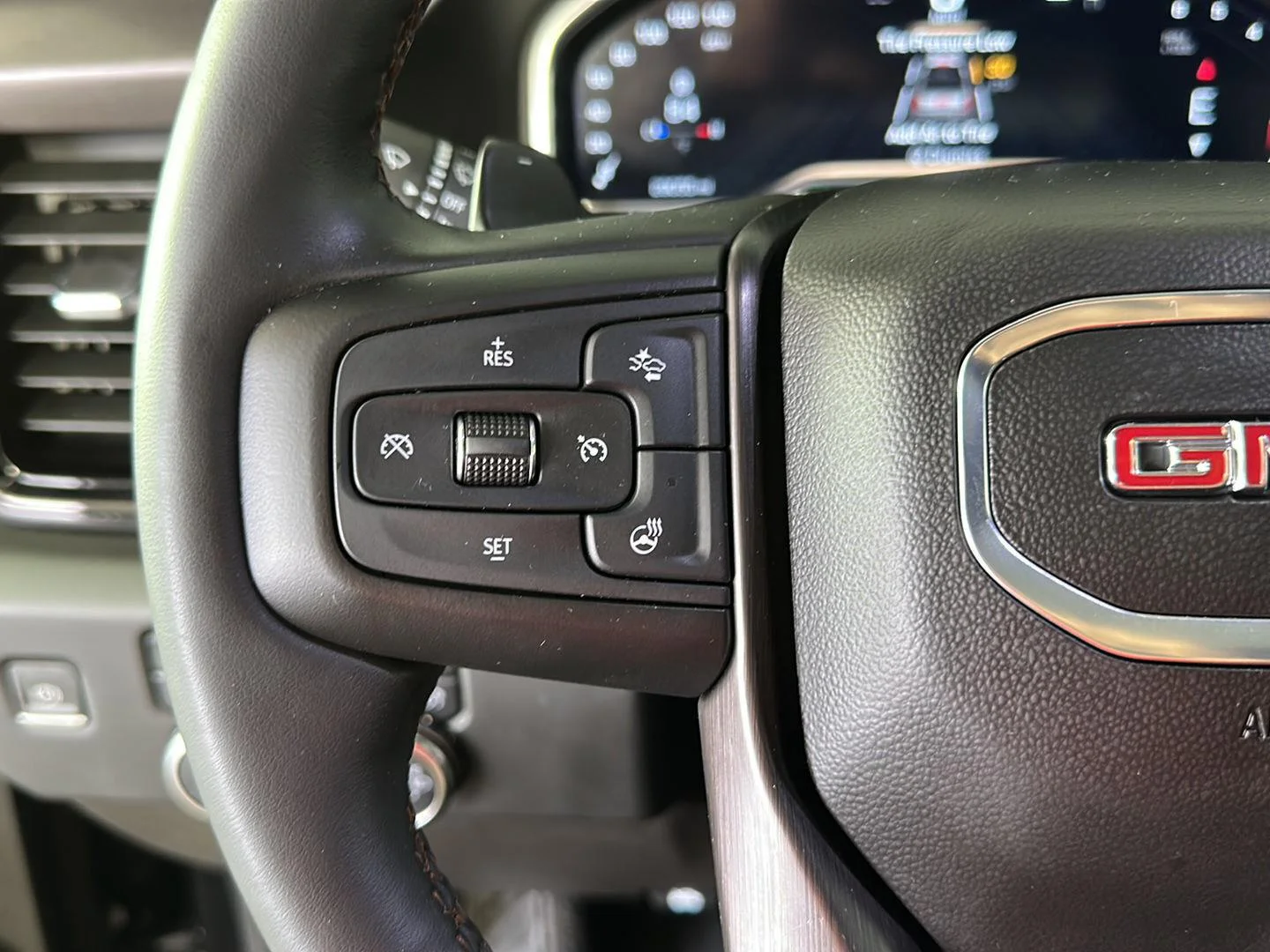 Used 2023 Titanium Rush Metallic GMC AT4 image 12