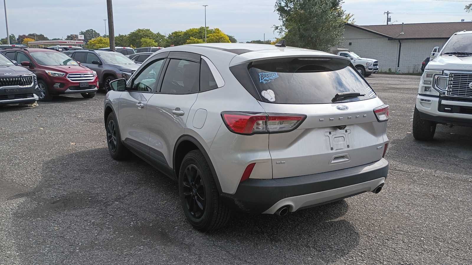 Used 2018 Ruby Red Metallic Tinted Clearcoat Ford SE image 4