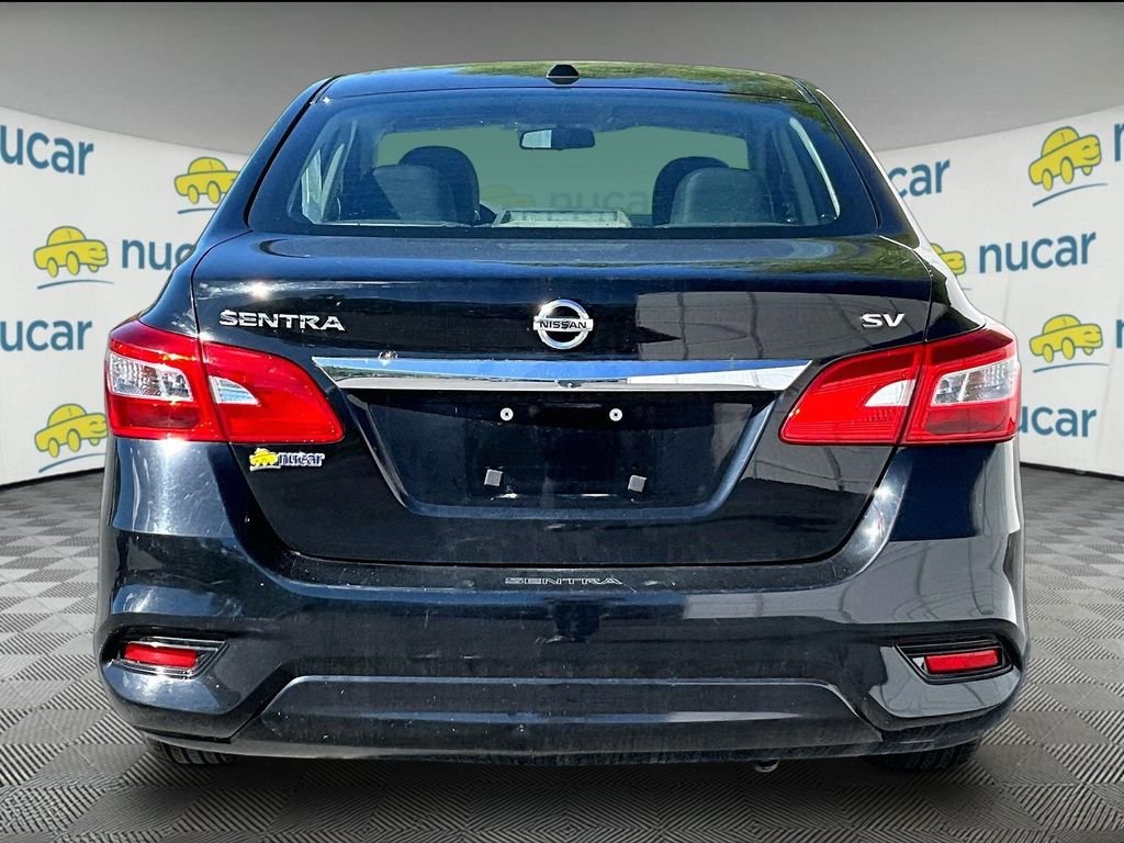 Used 2019 Super Black Nissan SV image 5