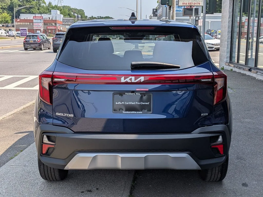 Used 2025 Blue Kia LX image 7