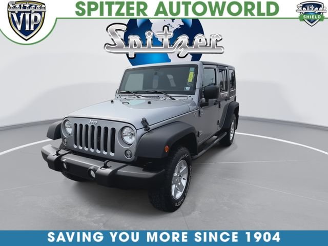 Used 2015 Silver Jeep Unlimited Sport image 4