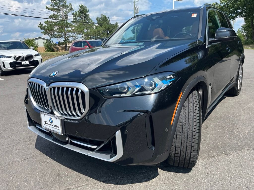 Certified Used 2024 Black Sapphire Metallic BMW xDrive40i image 3