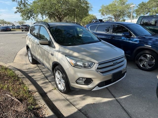 Used 2018 White Gold Metallic Ford SE image 2