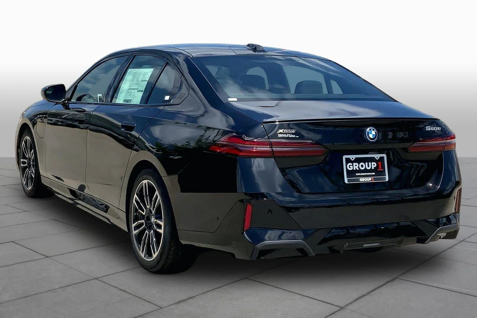 New 2026 Black Sapphire Metallic BMW 550e xDrive image 11