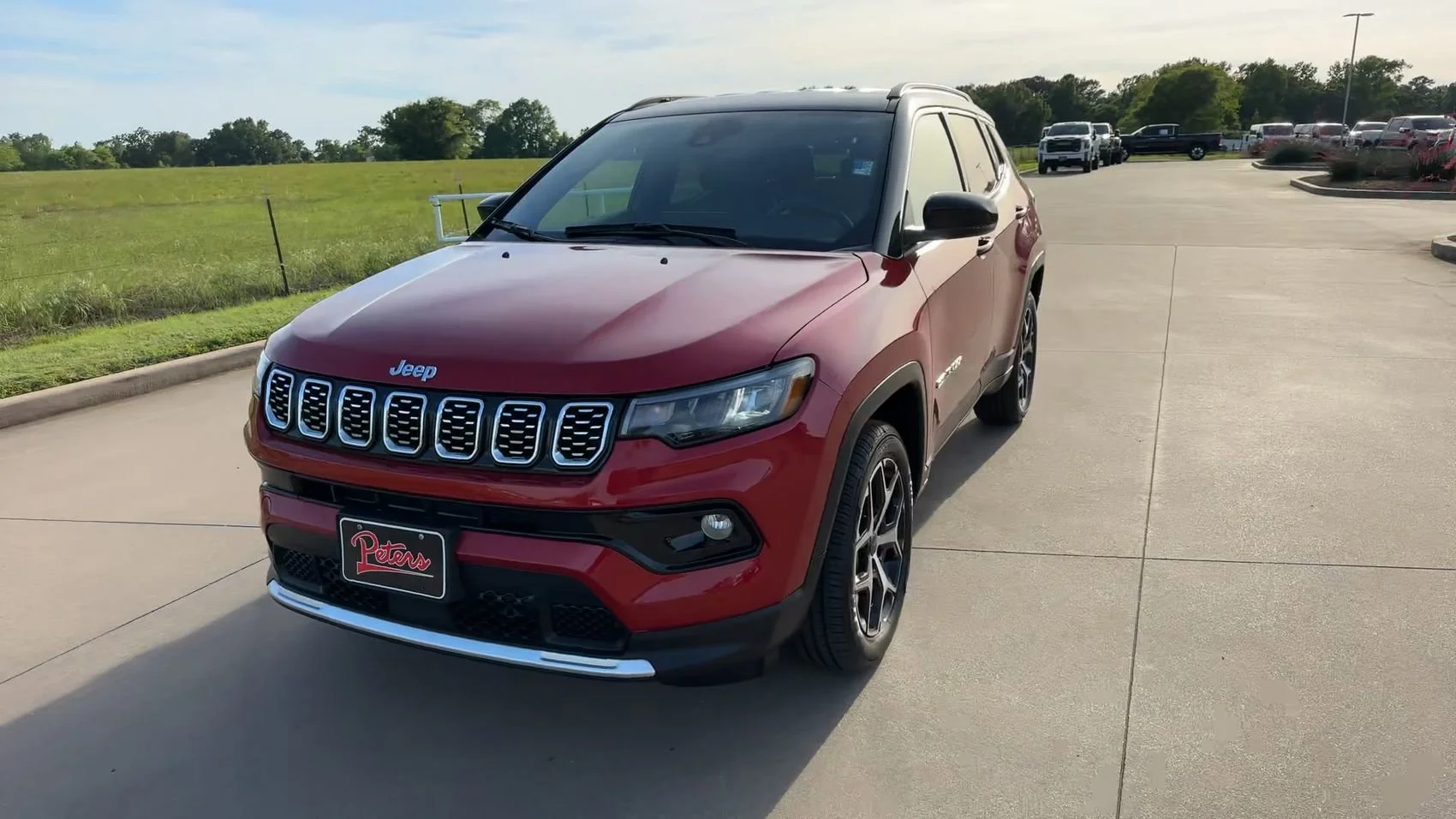 Used 2025 Red Hot Pearlcoat Jeep Limited image 4