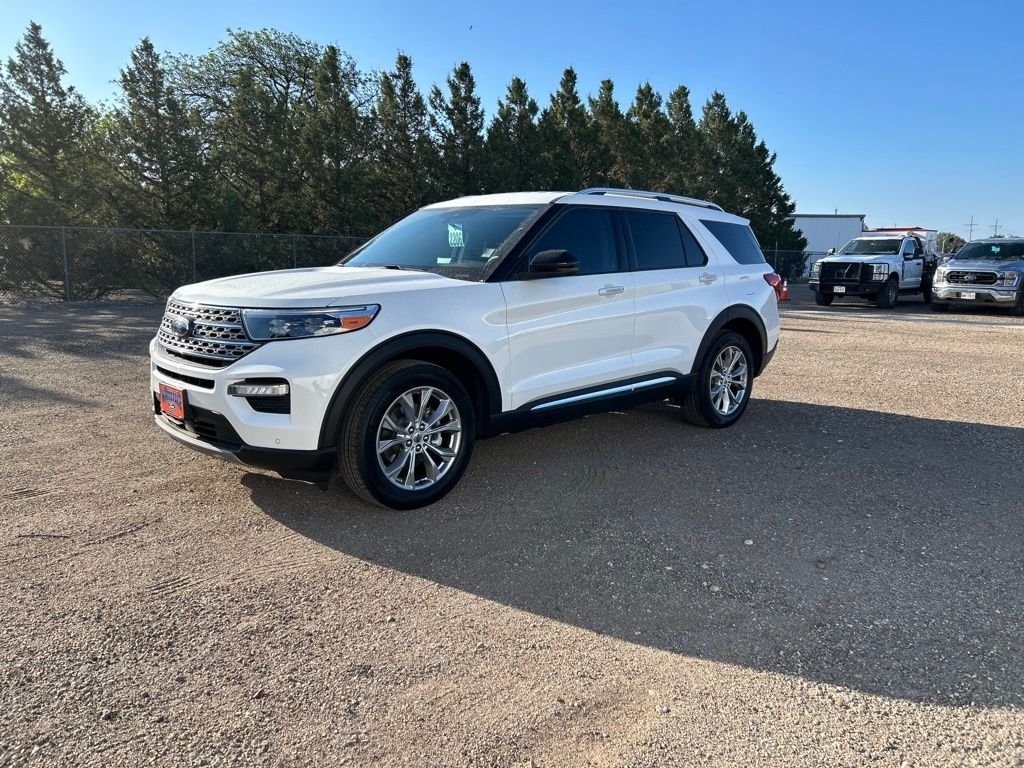 Used 2024 White Metallic Ford Limited image 1