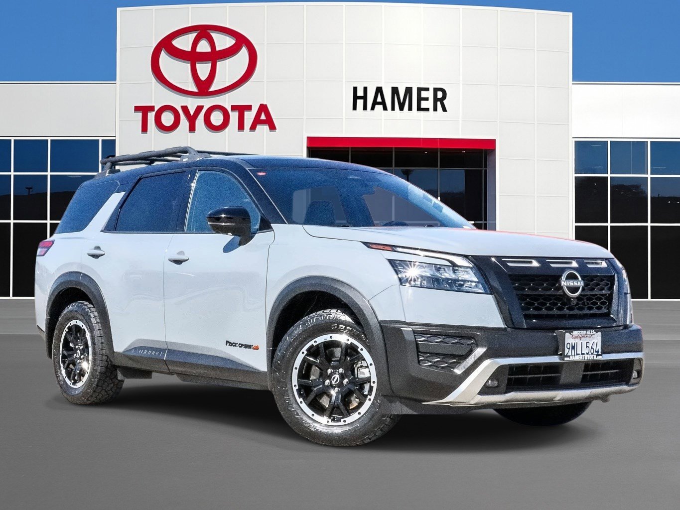 Used 2024 Solid Gray/Super Black Nissan Rock Creek image 1