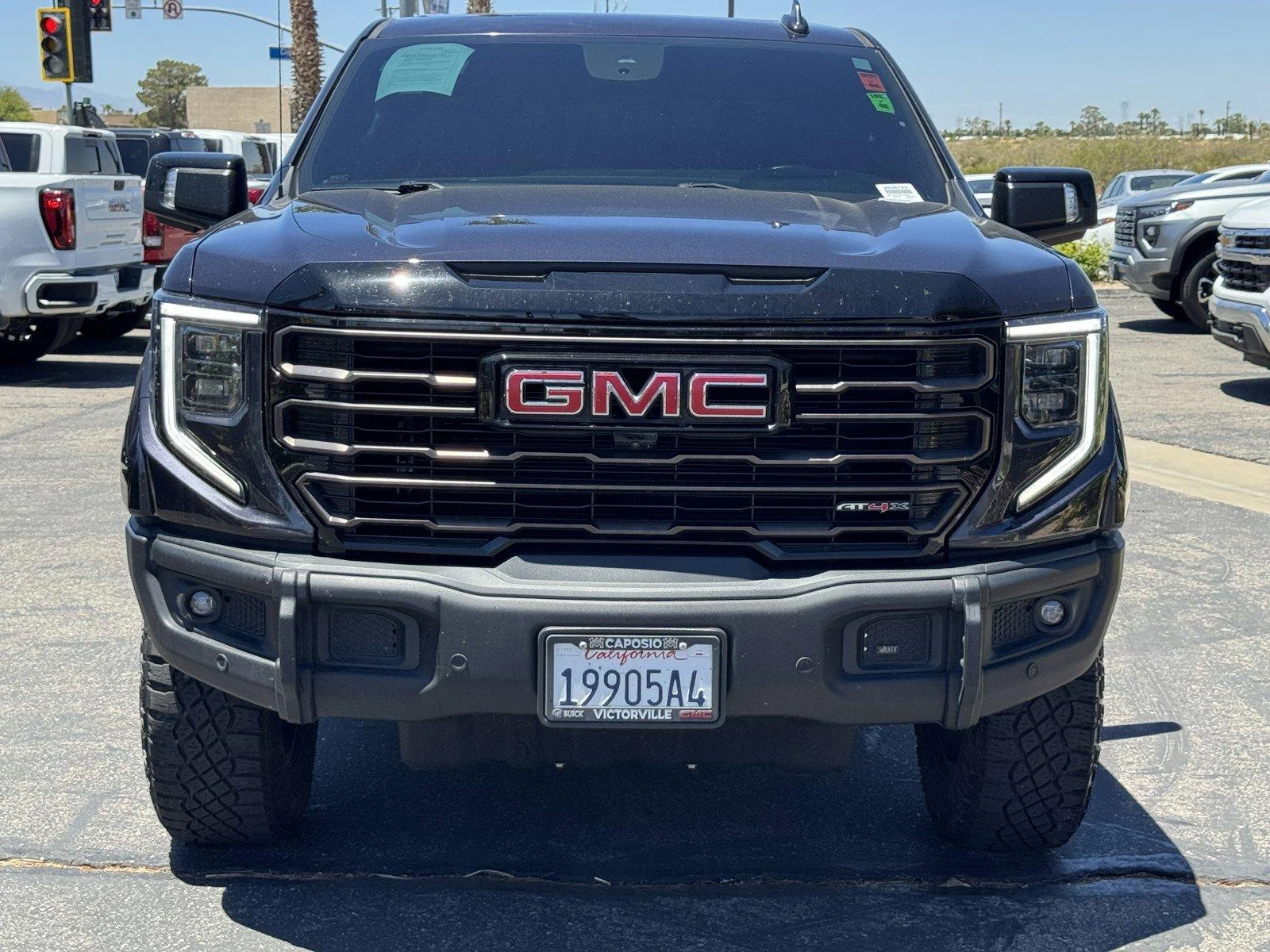 Used 2024 Titanium Rush Metallic GMC AT4X image 2