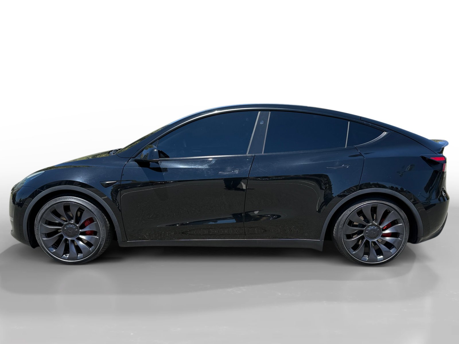 Used 2024 Solid Black Tesla Performance image 2