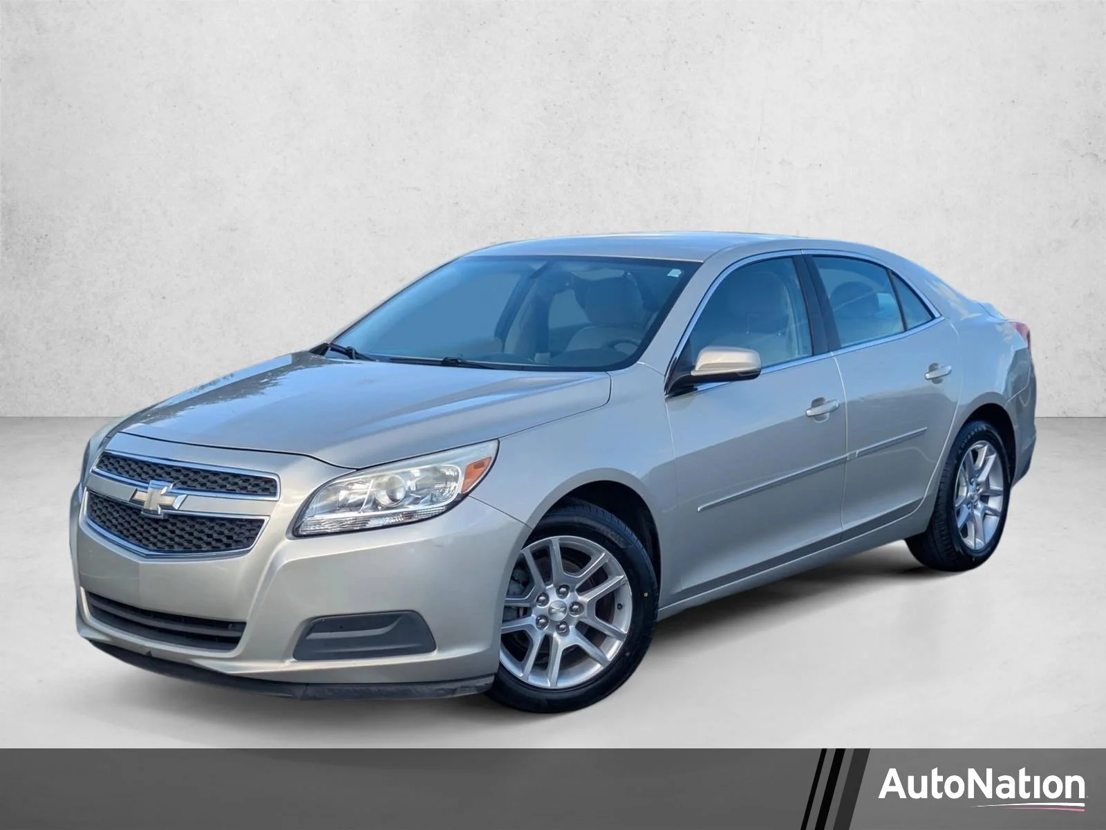 Used 2013 Champagne Silver Metallic Chevrolet LT image 1