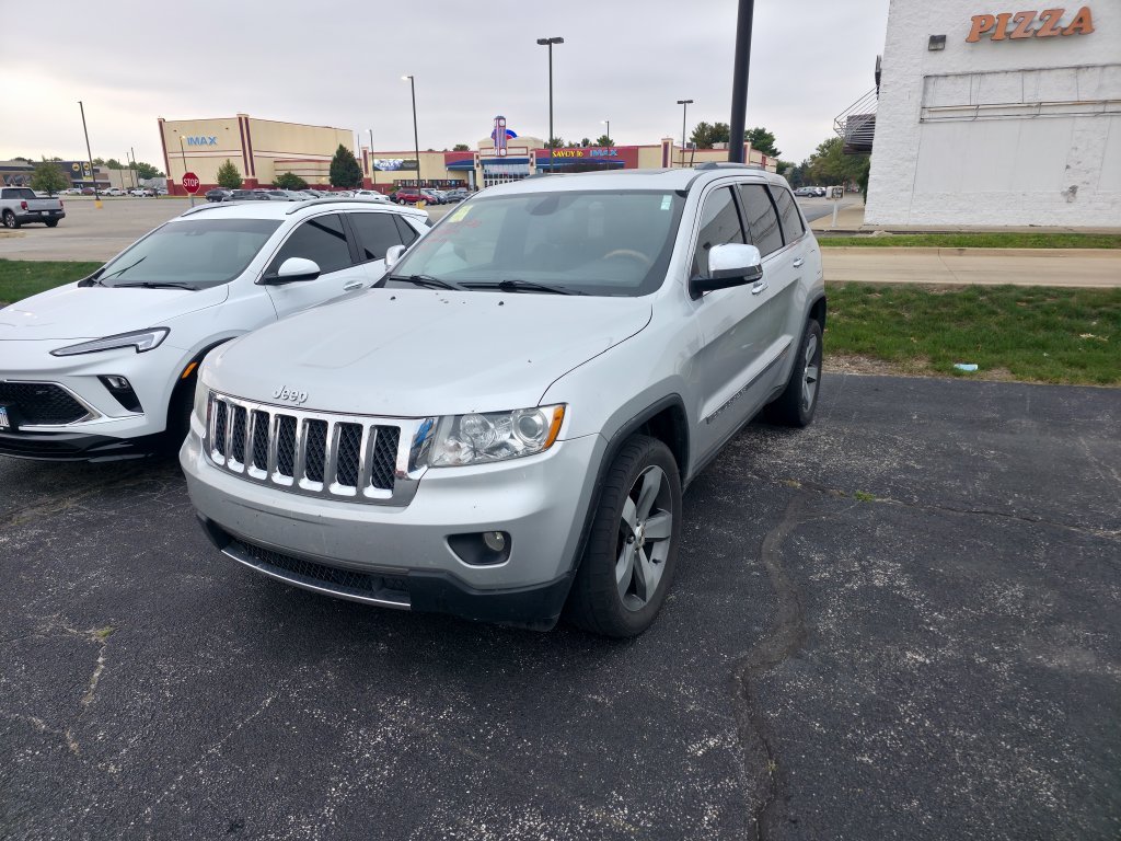 Used 2011 Bright Silver Metallic Clearcoat Jeep Overland image 6