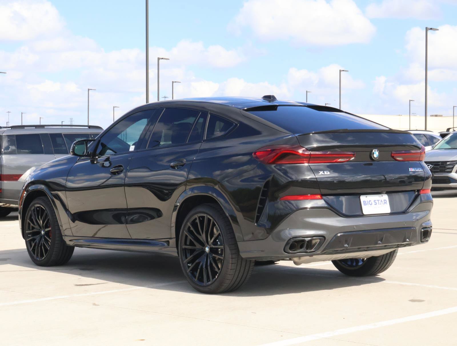 Used 2025 Black Sapphire Metallic BMW M60i image 3