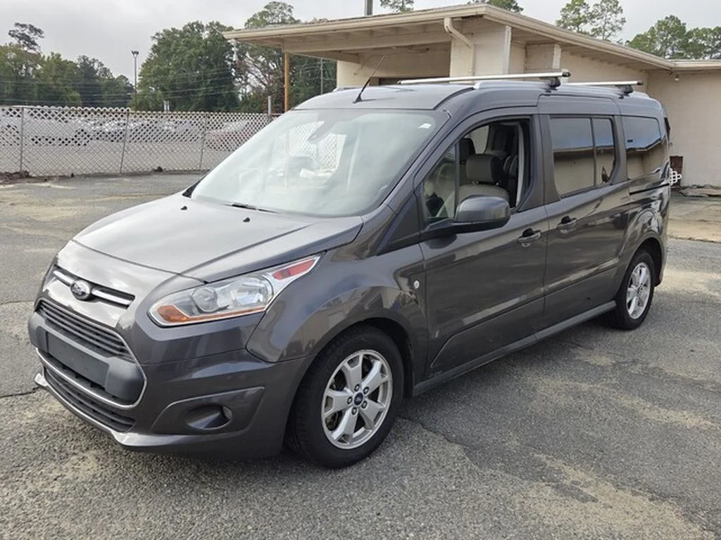 Used 2016 Magnetic Metallic Ford Titanium image 4