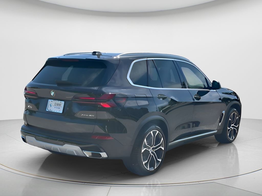 Certified Used 2025 Black Sapphire Metallic BMW xDrive40i image 5