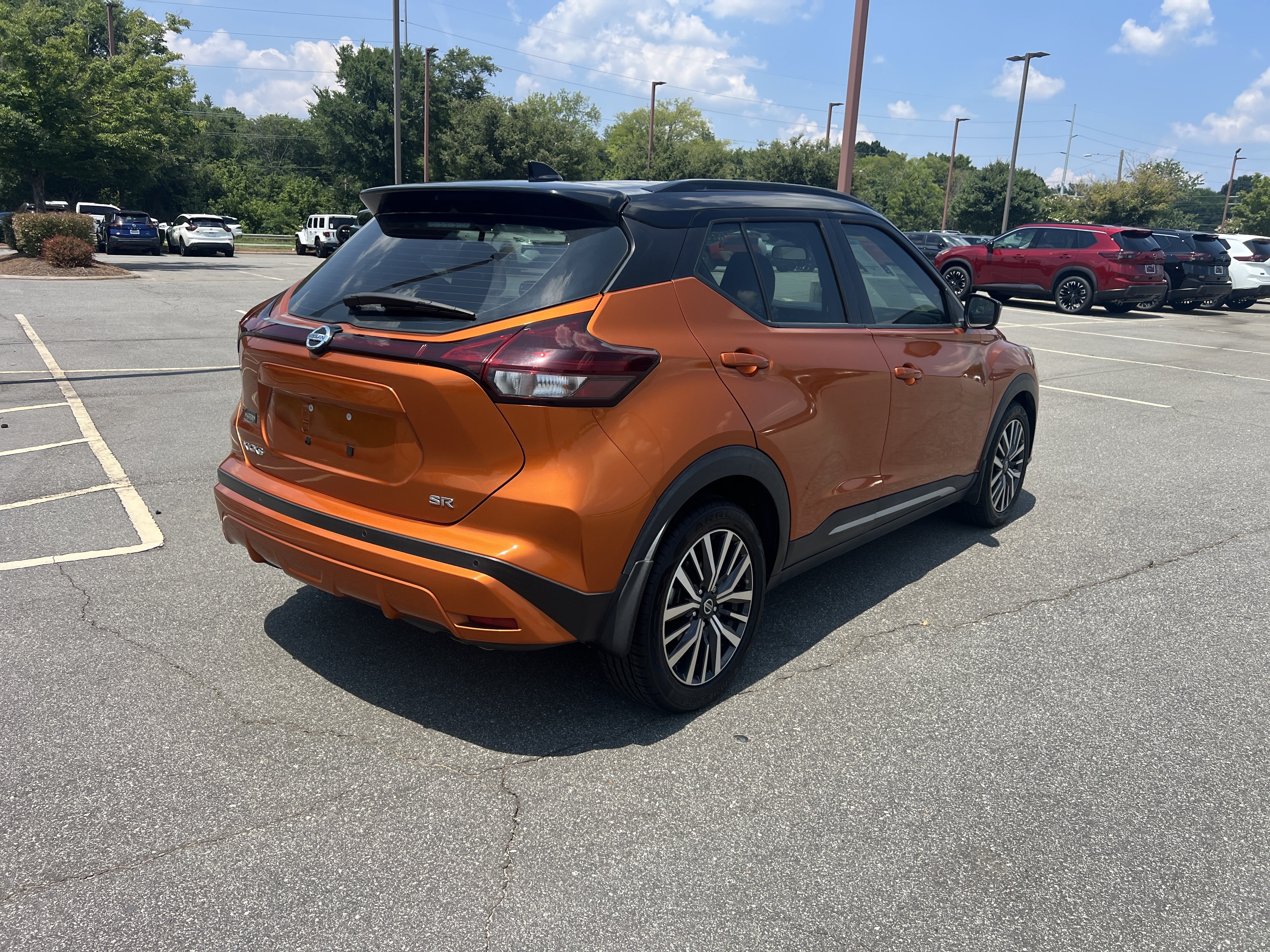 Used 2021 Monarch Orange/Super Black Nissan SR image 5