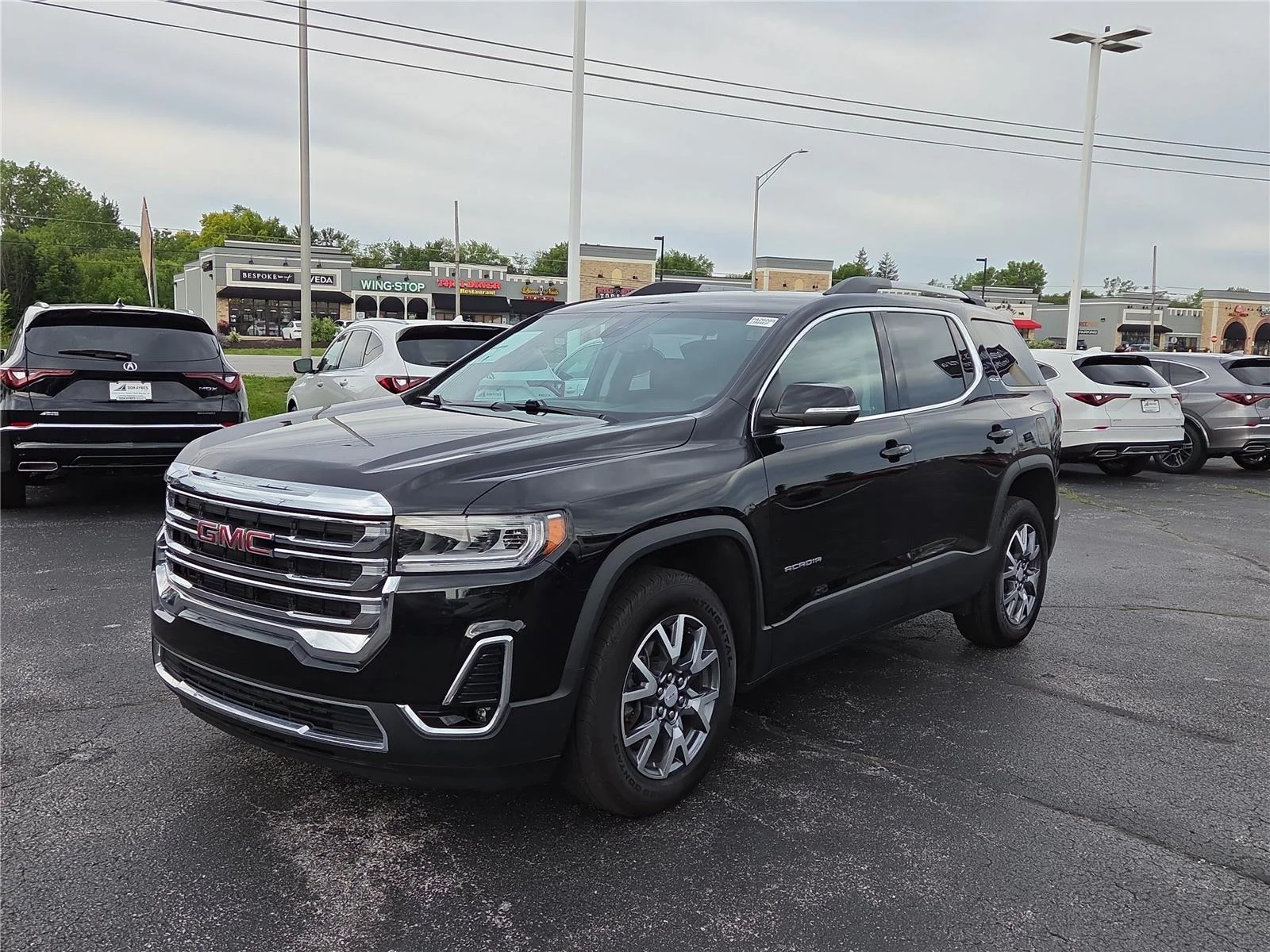 Used 2023 Ebony Twilight Metallic GMC SLT image 3