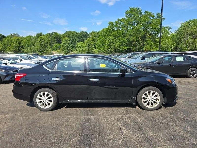 Used 2018 Black Nissan SV image 9