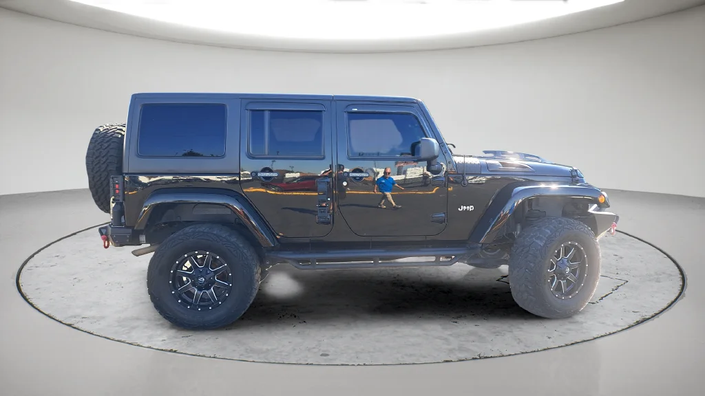 Used 2015 Black Jeep Unlimited Sahara image 3
