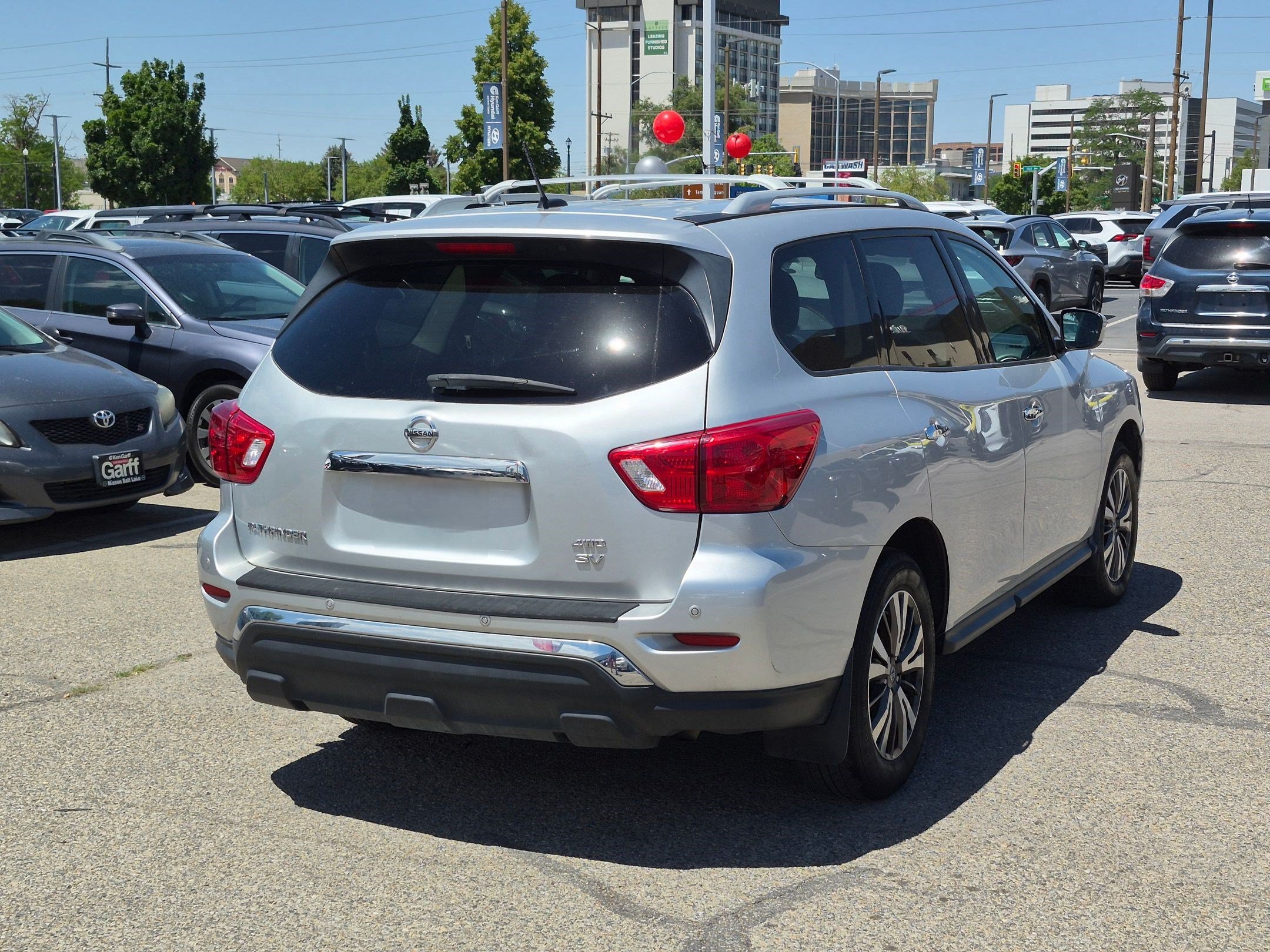 Used 2017 Brilliant Silver Metallic Nissan SV image 3