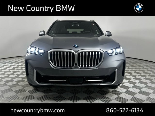 Used 2026 Skyscraper Grey Metallic BMW xDrive50e image 3