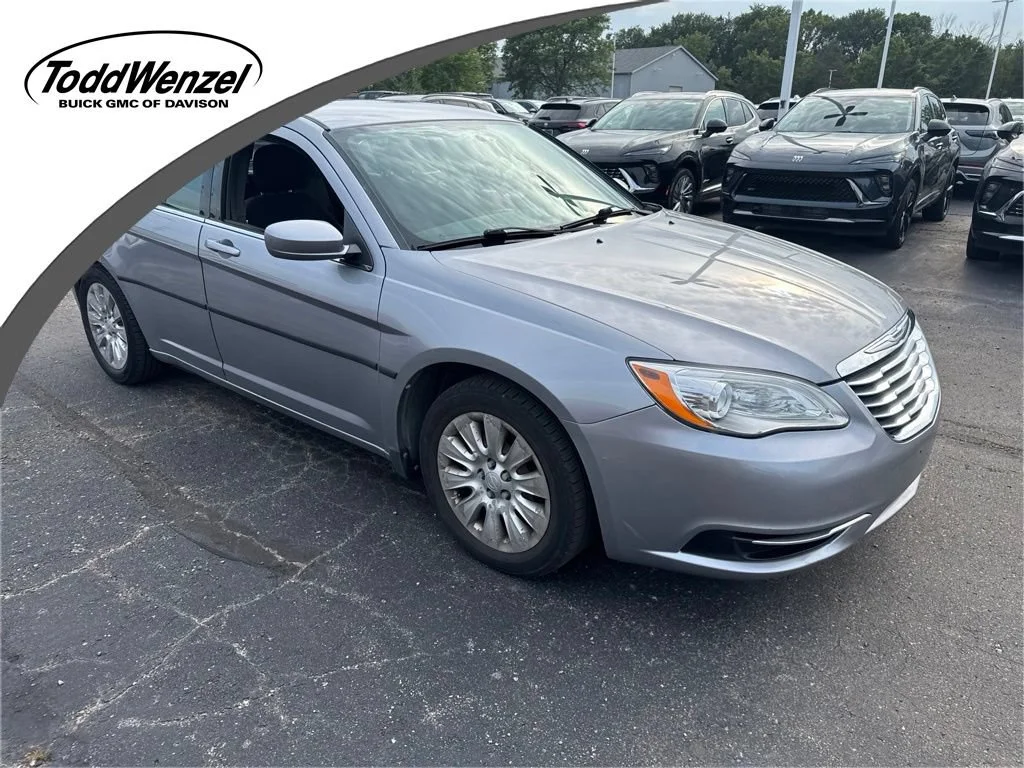 Used 2013 Silver Chrysler LX image 1