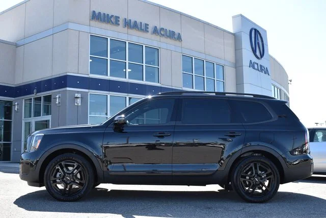 Used 2025 Ebony Black Kia SX X-Line image 8