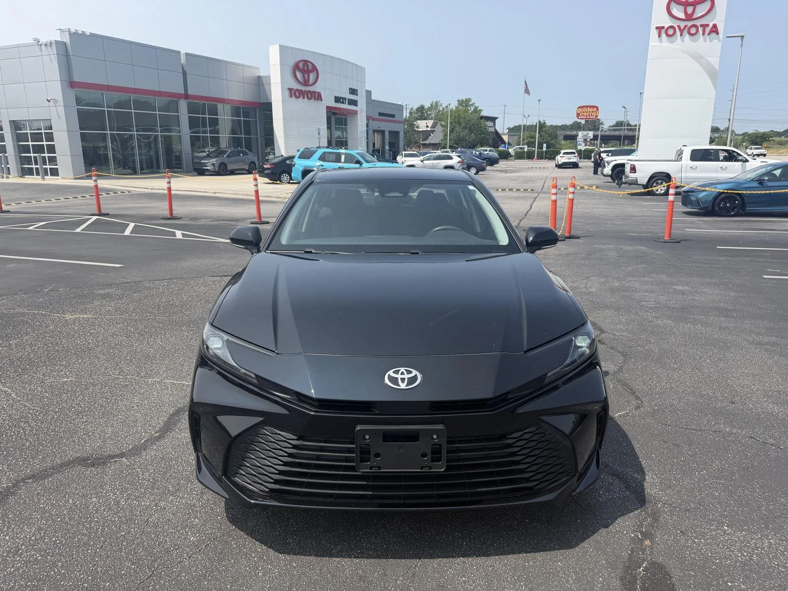 Used 2025 Midnight Black Metallic Toyota LE image 2